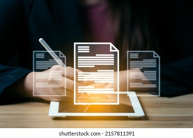 Business Woman Uses A Pen To Sign Electronic Documents On Digital Documents On A Virtual Screen. Electronic Signature, Technology And Document Management