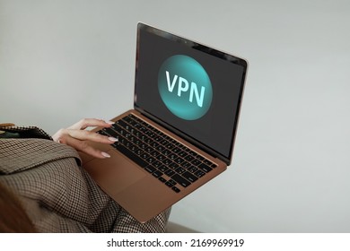 Business Woman Uses VPN On A Laptop. Data Encryption, IP Replacement, Secure Connection Concept. Cyber Security And Privacy, Protection Of Personal Information