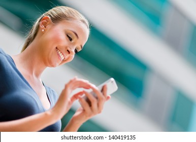 Business Woman Using App On A Smart Phone