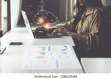 Business woman using cloud backup by laptop computer - Shutterstock ID 2186135581