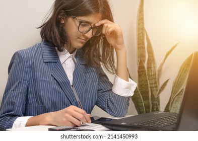 Business Woman Using Laptop And Calculator Analyzing Sales Data. Economic Growth Chart. Business Strategy. Digital Marketing