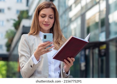 Business Woman Using Phone To Send Message