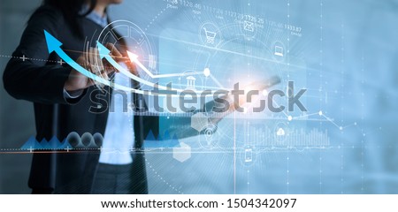 Business woman using tablet analyzing sales data and drawing growth graph with icon customer network connection on virtual interface, Business strategy, Digital marketing. 