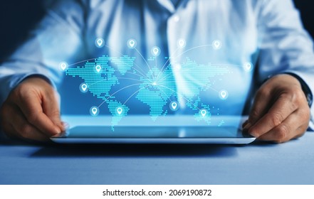 Business Woman Using Tablet With Futuristic Digital World Map With Global Business. Global Network Connection.E-commerce, Online Marketing And Global Business.
