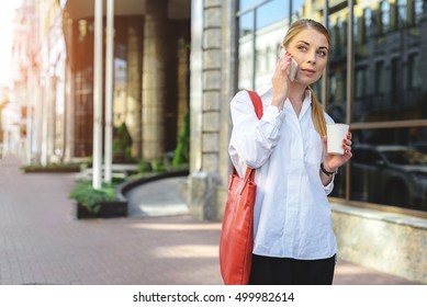 Business woman walking on street