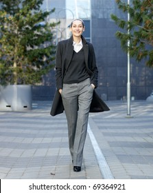 Business Woman Walking In The Park