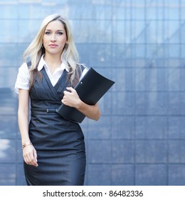 Business Woman Walking In The Street