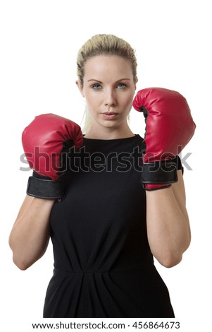 business woman wearing boxing gloves