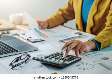 
Business Woman Working In Finance And Accounting Analyze Financial Budget In The Office