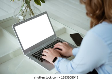 Business woman working at laptop, no face - Shutterstock ID 1883808043