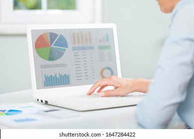 Business Woman Working On Financial Report Of Corporate Operations. Accounting Report Spreadsheet. 