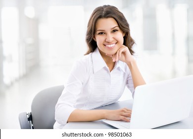 Business Woman Working On Laptop Computer At Office