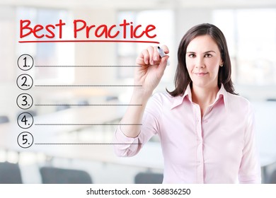 Business Woman Writing Blank Best Practice  List. Office Background. 