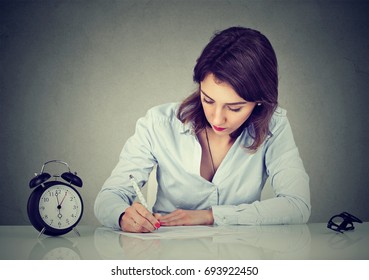 Business Woman Writing A Letter Or Filling Out An Application Form 