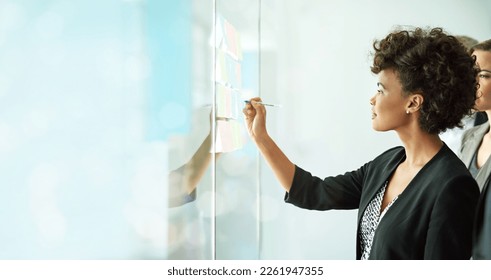Business woman, writing and team planning for schedule, strategy or brainstorming sticky notes on mockup. Female in write, post it or teamwork collaboration for corporate growth, idea plan or tasks - Shutterstock ID 2261947355