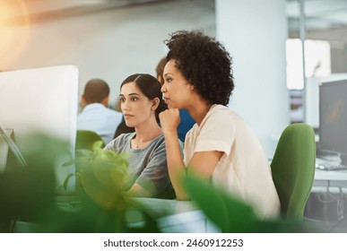 Business women, computer and teamwork or thinking of online ideas, planning or project startup in workspace. Graphic designer, mentor or worker reading proposal or brief for website on office desktop - Powered by Shutterstock