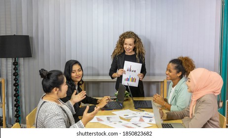 Business women from different ethnic races and cultures working together in an office for business development or plan - Shutterstock ID 1850823682