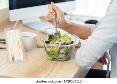 Business Women Eating Salad Box And Egg Sandwich Box. Eat Lunch For Work With Partnership At Workplace.