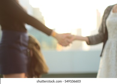 Business Women Shaking Hands