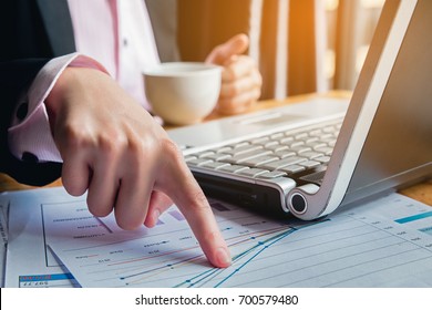 Business women sit and pointing on the summary report to analyze marketing information.
business women sitting in the morning with coffee.Finance concept - Shutterstock ID 700579480