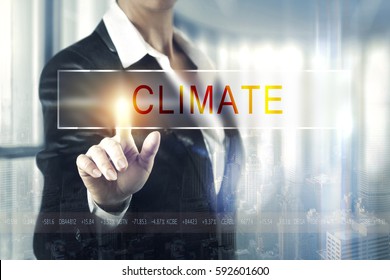 Business Women Touching The Climate Screen