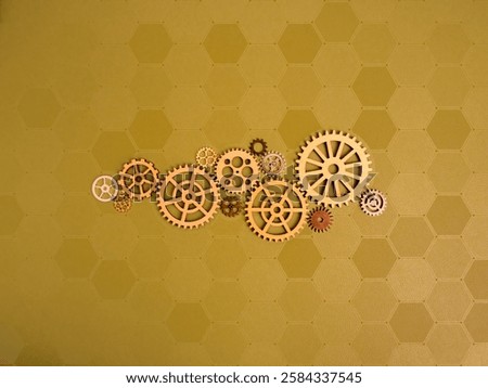 Business workflow system, strategy and data online technology management concept. Many pattern of gear and cog wheel working process on hexagon bee network pattern, gold background, minimalist.