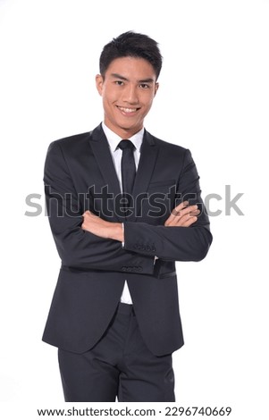 Business young man in suit,tie with, cross arms  isolated studio. Happy business professional man smile in formal suit isolated on white background