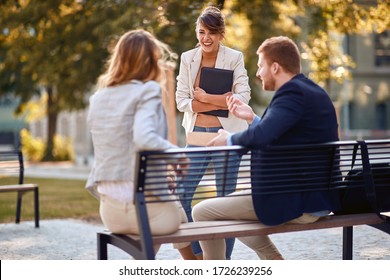 business young team discuss at the outdoor. Business Colleagues Outside Office. - Powered by Shutterstock