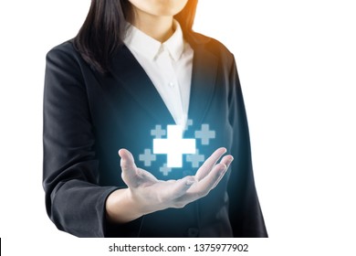 business young woman wearing black suit standing hand show plus sign, offer positive thing, represent benefits results of positive thinking towards corporate social responsibility. - Shutterstock ID 1375977902