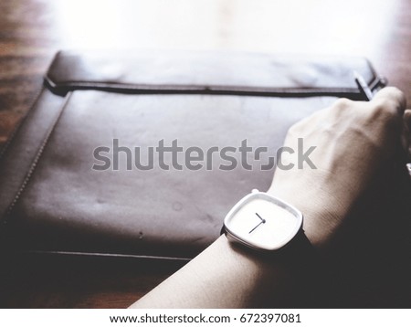 Similar – Image, Stock Photo Elegant woman wearing blue dress, wristwatch holding handbag