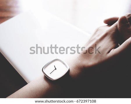 Similar – Image, Stock Photo Woman calling on phone wearing blue dress and silver wristwatch