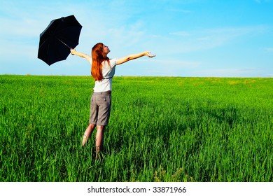 Business-kontsept on the nature with an umbrella - Shutterstock ID 33871966