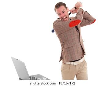 Businessman About To Smash A Laptop Computer Wearing A Suit And Tie. White Background.