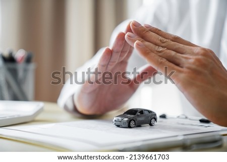 Businessman agent meeting customer with insurance policy about car contract.Salesman Automobile Vehicles Concept.