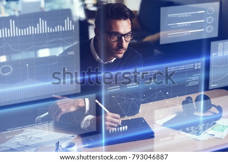 Businessman analysing the data