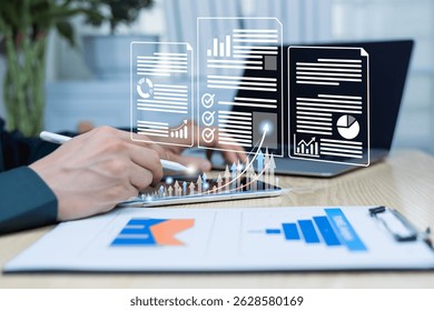 Businessman analyst graphs the growth of sales data on modern interface icons of strategy, digital online marketing, solution analysis and content development on global network connectivity.