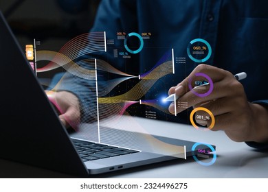 Businessman analyze and visualize complex information on a virtual screen using AI to process data. Big data technology and data science.Data flow.Digital neural network.artificial intelligence - Shutterstock ID 2324496275