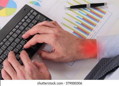 Businessman Analyzing Data. Close Up Of Man Hands Typing On Computer Keyboard