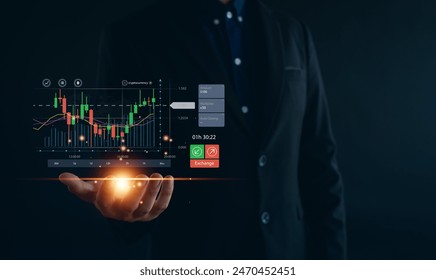 Businessman analyzing forex trading graph financial data. Business finance background.business finance technology and investment concept. Stock Market Investments Funds and Digital Assets.