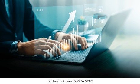 Businessman analyzing growth data using digital dashboard and laptop. Futuristic interface showing rising graph and financial metrics. Concept of smart investment, fintech, and business performance.