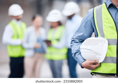 Businessman, architect and helmet for safety in construction, project management or meeting on site. Man holding hard hat for industrial architecture, teamwork or maintenance and building in the city
