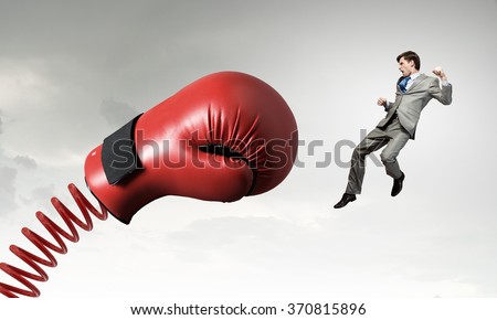Businessman attacked by glove