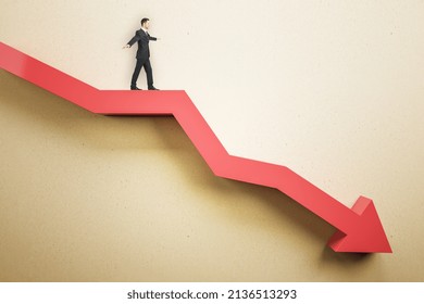 Businessman balancing on abstract red downward chart arrow on light background. Down, drop, finance and crisis concept. Mock up place