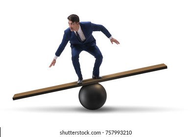Businessman balancing on seesaw in uncertainty concept
