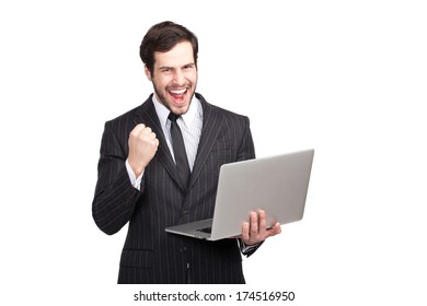 businessman beeing a winner with a laptop in his hands, isolated