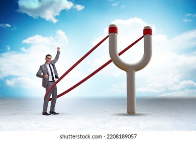 Businessman Being Launched From Slingshot In Career Concept