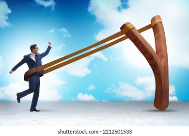 Businessman Being Launched From Slingshot In Career Concept