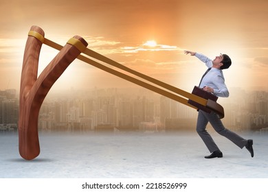 Businessman Being Launched From Slingshot In Career Concept