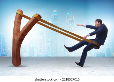 Businessman Being Launched From Slingshot In Career Concept