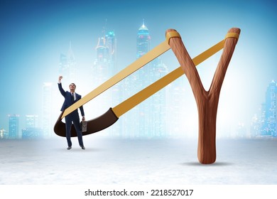 Businessman Being Launched From Slingshot In Career Concept